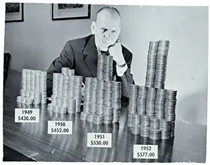 Taxes Prints: Man Seated W/Coins Representing Tax Incr