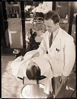 Man Being Shaved By Barber