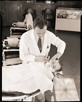 Razor Prints: Man Being Shaved by Barber
