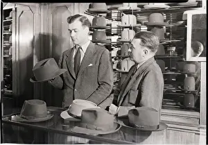 Counter Prints: Man Shopping for Hat