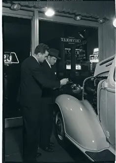 Dealer Prints: Man Signing Piece of Paper