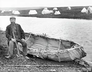 Expedition Prints: Man Sitting Next To Canvas Canoe