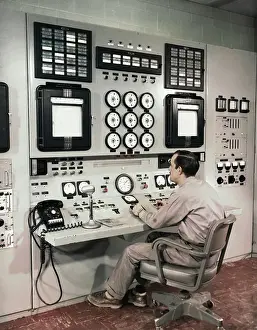 Lemont Prints: Man Sitting at Control Panel of Nuclear Reactor