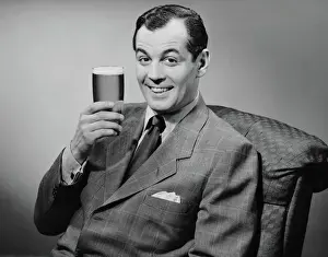 Man sitting & having a beer