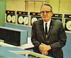 Man Sitting in Old Style Computer Room