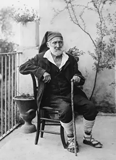 Taormina Prints: Man Sitting on His Porch
