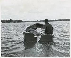 Man in Small Motor Boat