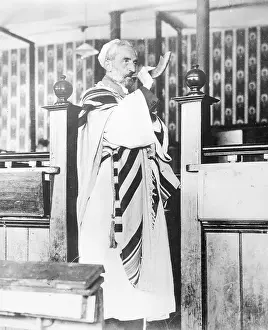 Man Sounding Ram's Horn