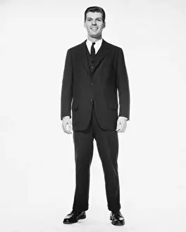 Legs Apart Prints: Man standing, smiling