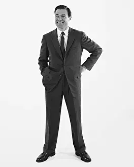 Legs Apart Prints: Man standing, smiling