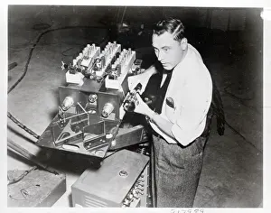 Man Stands Behind Camera