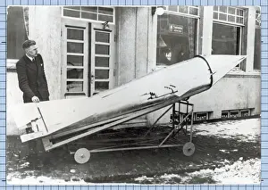 Outer Space Prints: Man Stands Next To Small, Early Rocket
