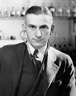 Man with stethoscope on his head