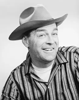 40 49 Years Prints: Man in stetson hat posing in studio, (B&W), portrait