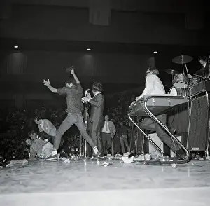 The Beatles Prints: Man Storming the Stage at Beatles Concert