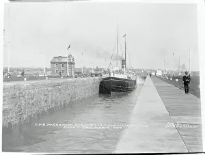 Man Strolling Along Harbor