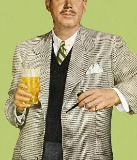 Man in Suit Holding Beverage