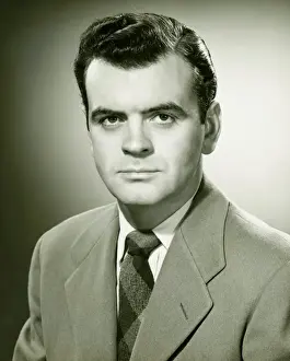 40 49 Years Prints: Man in suit in studio, (B&W), portrait