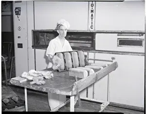 Laborer Prints: Man Taking Bread Loaves from Oven