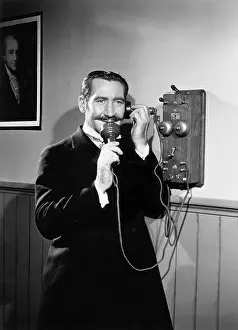 Broadcast Tower Prints: Man Talking On Duel-Transmitter Phone