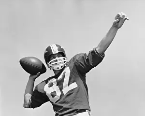 Man throwing football