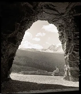 Tunnel Prints: Man At Tunnel Entrance Looks Over Park