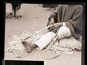 Twisting Prints: Man Twisting Rope with His Feet