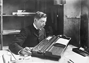 Computer Prints: Man Using Calculating Machine