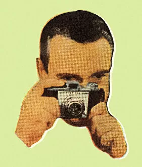 Images Dated 21st December 2015: Man Using a Camera