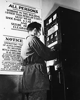 Counter Prints: Man Using a Geiger Counter to Check for Radioactive Particles