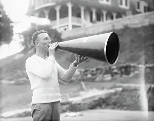 Loud Prints: Man Using a Megaphone