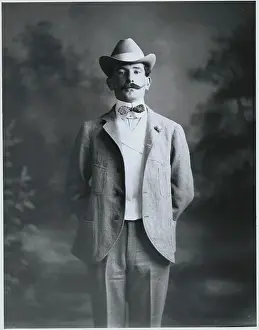 Man W/Handle-Bar Moustache in Suit, Hat