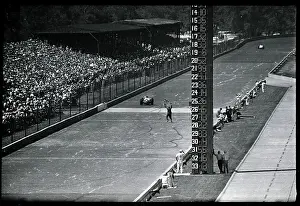 Foyt Prints: Man Waving Checkered Flag on Racetrack