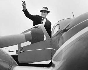 Business Travel Collection: Man waving, getting in plane