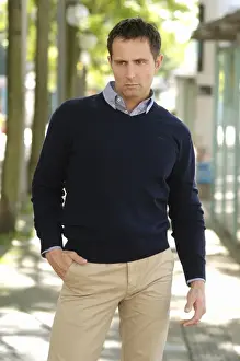 Jumper Prints: Man wearing casual clothes standing in an avenue