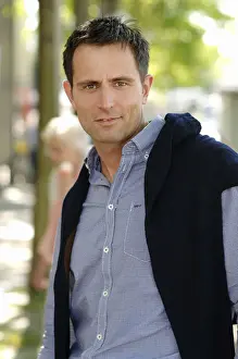 Jumper Prints: Man wearing casual clothes standing in an avenue