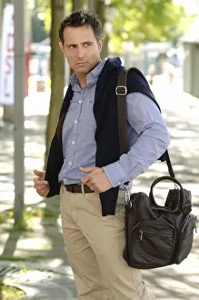 Jumper Prints: Man wearing casual clothes standing in an avenue