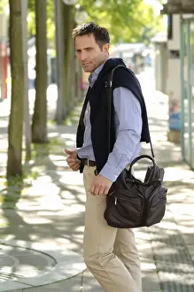 Jumper Prints: Man wearing casual clothes standing in an avenue