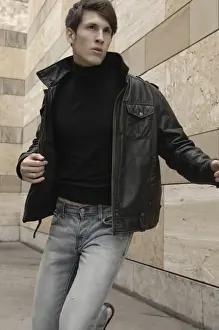 Animal Skin Prints: Man wearing a leather jacket, running