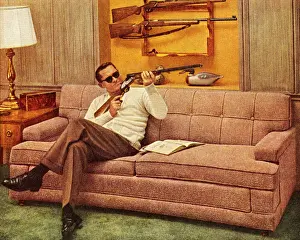 Home Decorating Prints: Man Wearing Sunglasses and Holding Gun