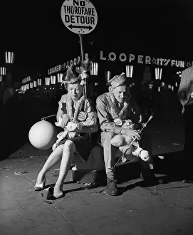 Amusement Park Prints: Man and Woman in amusement park