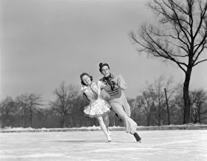 Facial Expression Gallery: Man Woman Couple Pair Figure Skating On Ice Rink Smiling Costumes Arm In Arm Leaning Precision