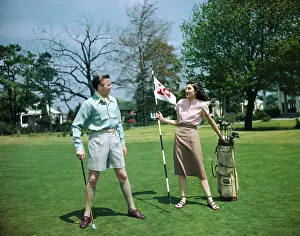 Man and Woman in Golfing Clothes