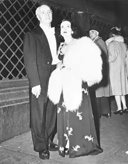 Partygoer Prints: Man And Woman Leaving Fashion Show