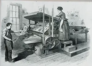 Man and Woman Printing Periodical