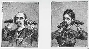 Man And Woman Using Old Fashioned Phones