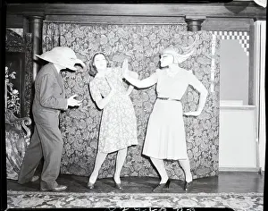 Benda Prints: Man and Two Women Wearing W.T. Benda Masks