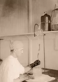 Images Dated 31st August 2005: Man working in laboratory (B&W sepia tone)