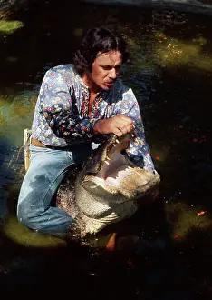 Man Wrestling Alligator