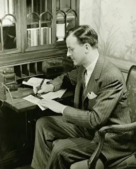 House Interior Prints: Man writing letter at bureau, (B&W)
